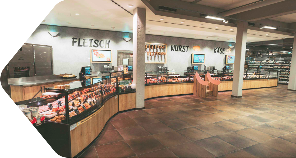 REWE Kunkel geschwungene Theke mit Thekenschalen